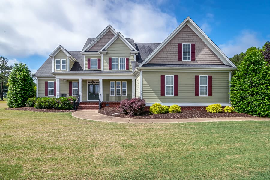 A single-family suburban house, the most common first rental property